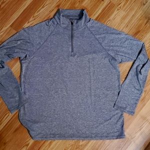 NWOT fine designs long sleeve quarter zip polyester spandex sport shirt.